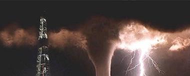 This Tornado is not really happening here but it looks like our local mast and I couldn't resist it.  The photographer was after lightning and only spotted the tornado when it was lit up