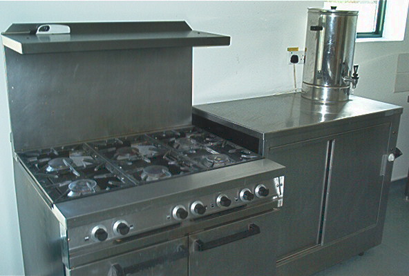 Gas double 	oven with six ring hob, 	hot food cabinet and portable hot water urn